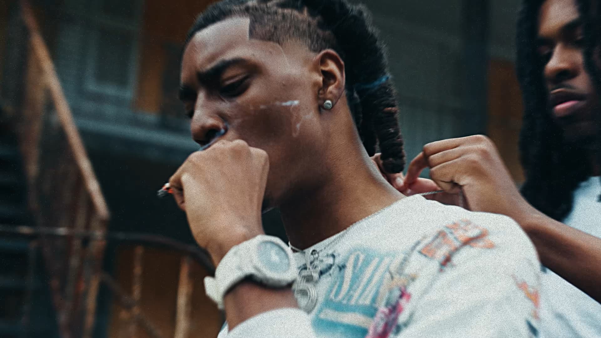 Close-up of RW 5ive wearing a 5 chain